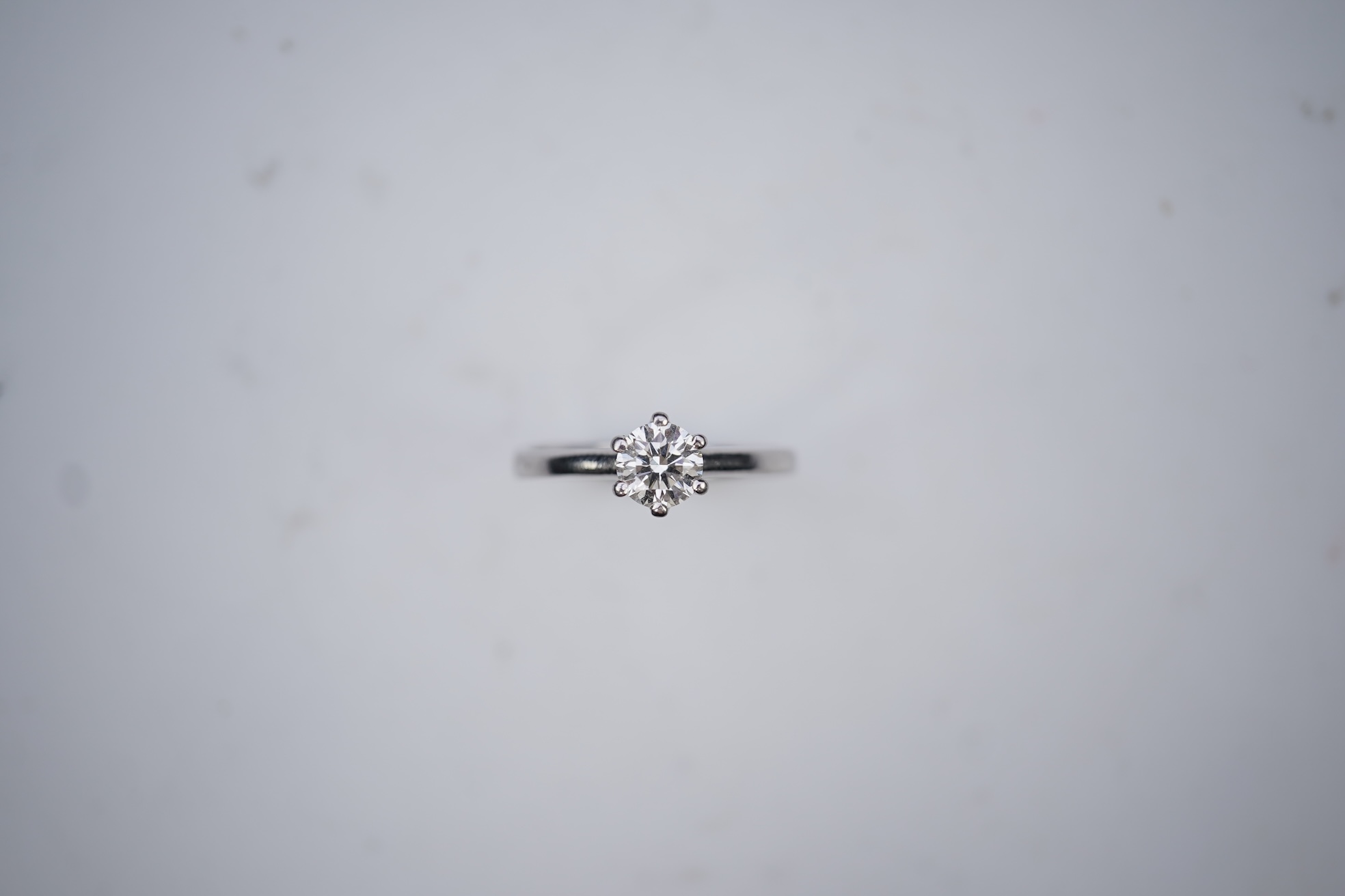 A diamond solitaire ring